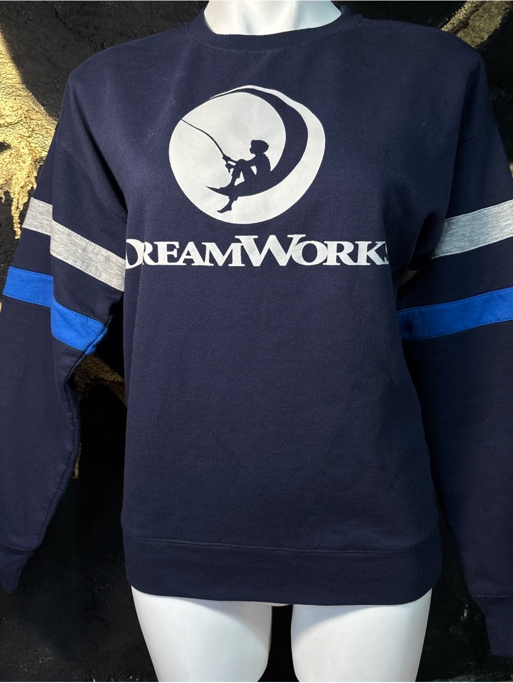 DreamWorks Navy Crewneck Sweatshirt with White Logo and Blue Sleeve Stripes | M